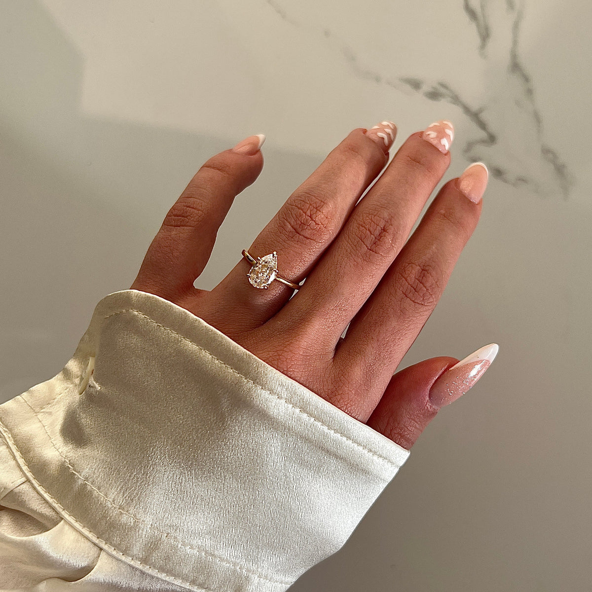 PEAR CUT SOLITAIRE RING